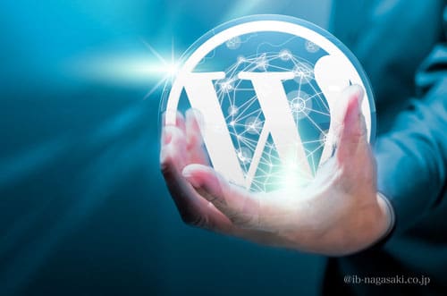ビジネスマンがWordPressのロゴを手荷物